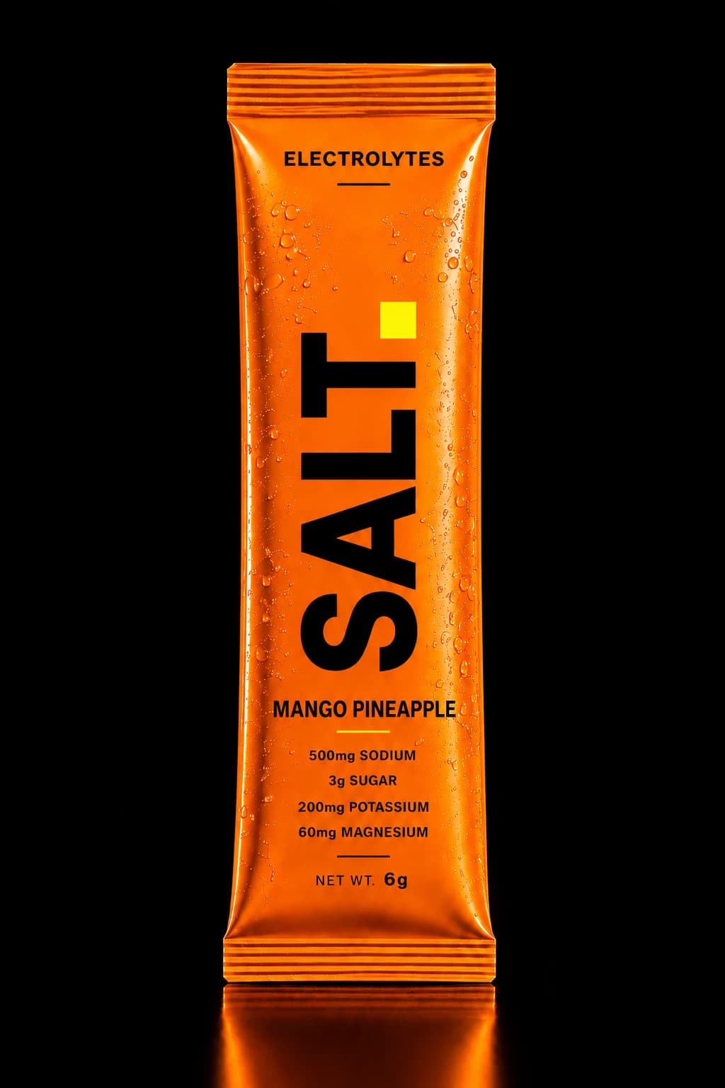 SOLT Mango Pineapple sachet — vivid orange pack on a dark stage, 500mg sodium, 3g sugar per serve.